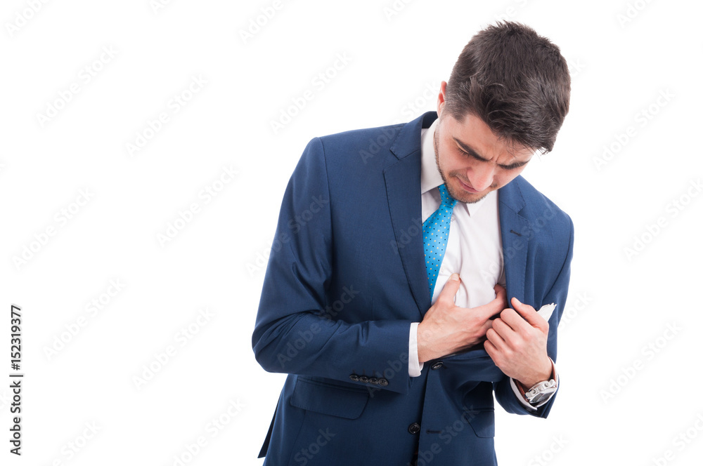 Sick salesman grabbing his painful chest with hand Sick salesman grabbing his painful chest with hand