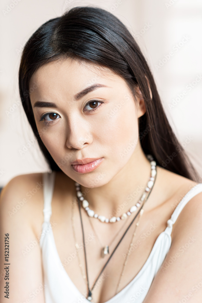 close up portrait of beautiful asian woman in white dress close up portrait of beautiful asian woman in white dress