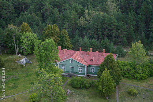 View from above, houses located among the trees. Kolka, Latvia