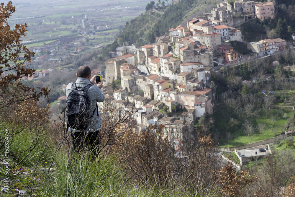 hiker on mountain trail at pietravairano village