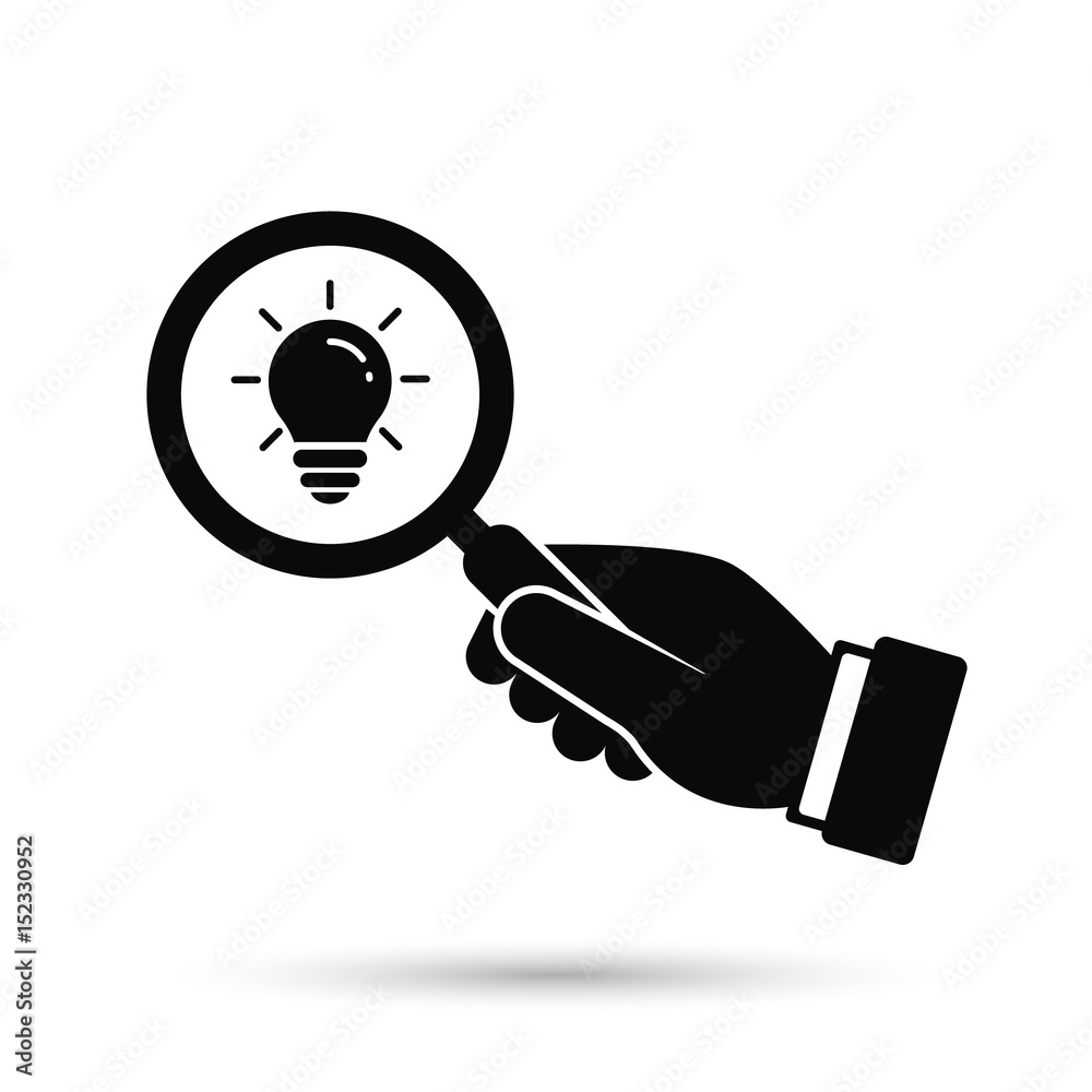 Search idea light bulb icon. Hand hold magnifier and find light bulb. Vector.
