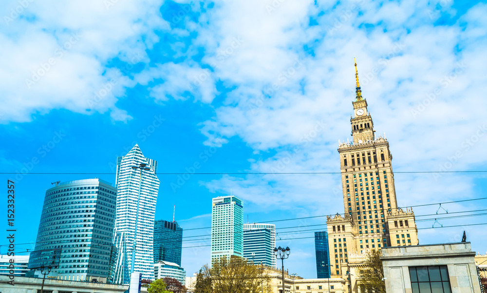 Panorama of Warsaw with modern skyscrapers on a sunny day with a blue sky overlooking the Palace of Culture