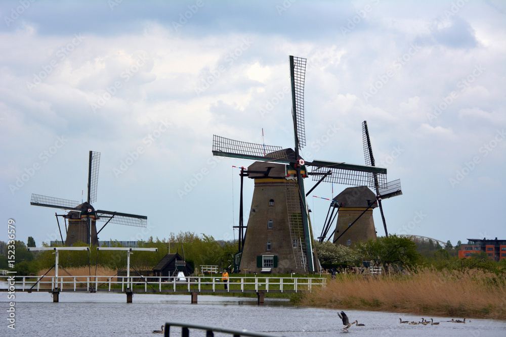 The old windmills in Netherlands on a cloudy day