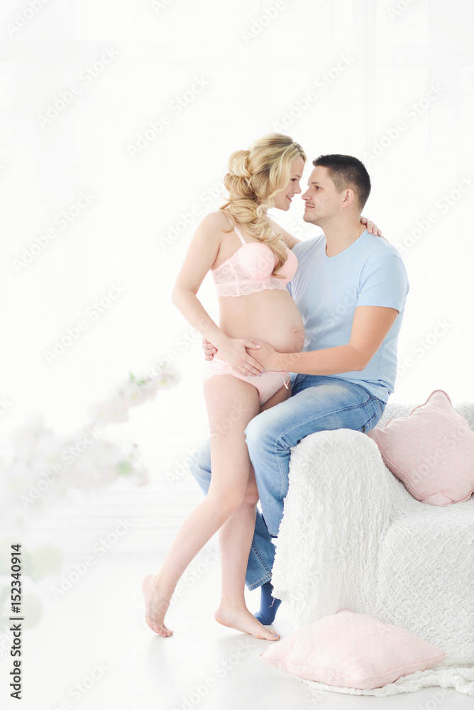 pregnant woman and her husband. Waiting for baby pregnant woman and her husband. Waiting for baby