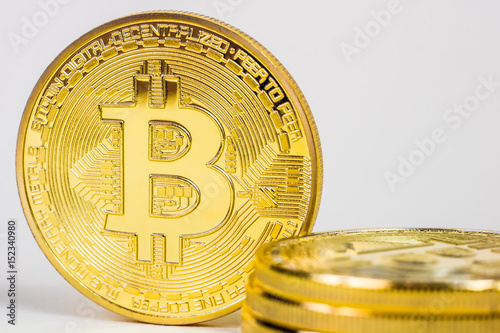 Photo Of Golden Bitcoin virtual currency coin. photo