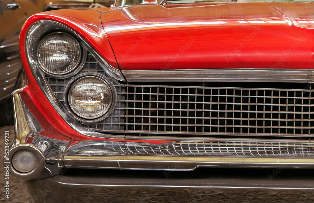 Color detail on the headlight of a vintage car