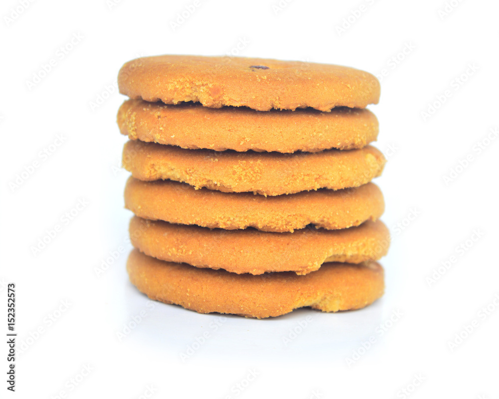 Single round ginger biscuits rool with crumbs isolated on white from above. Single round ginger biscuits rool with crumbs isolated on white from above.