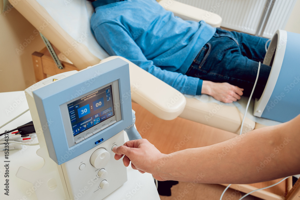 therapy system. Patient with doctor in office. Stock Photo Adobe Stock