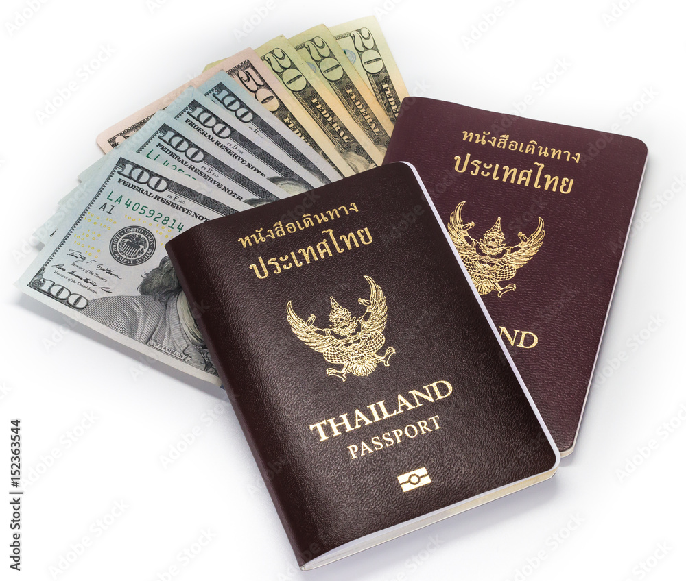 Dollar banknote and Thailand passport on isolated white background Dollar banknote and Thailand passport on isolated white background