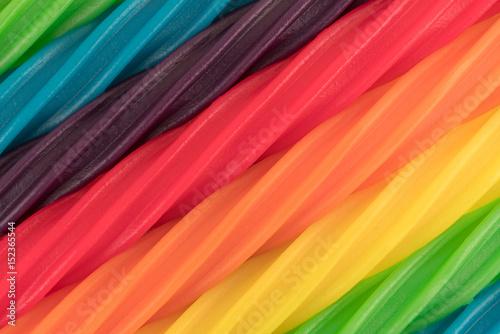 Close view of colorful spiral licorice sticks.
