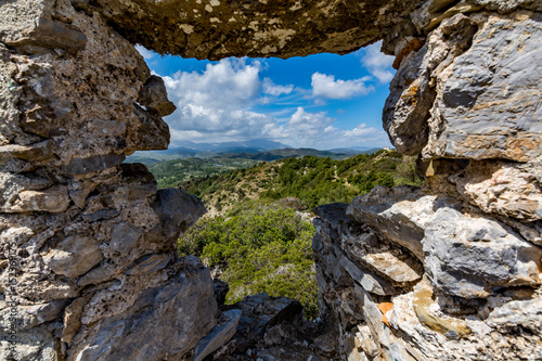 Asklepios castle on a beautiful day, view through one of the windows, Rhodes island, Greece