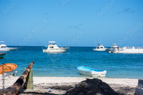 White boat makes fishing with spinning on a large sea fish in the Caribbean Sea