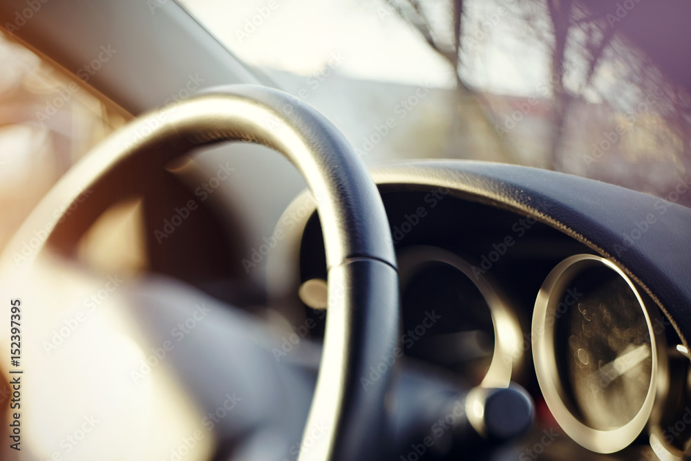 Steering wheel and the instrument panel on the dashboard of the car. Steering wheel and the instrument panel on the dashboard of the car.