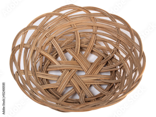 Ancient wicker basket on a white background