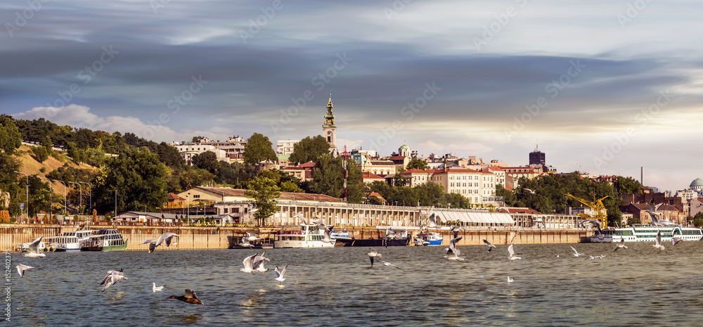 Belgrade Downtown Cloudy Sunset Panorama With Tourist Port Viewed From Sava River Perspective