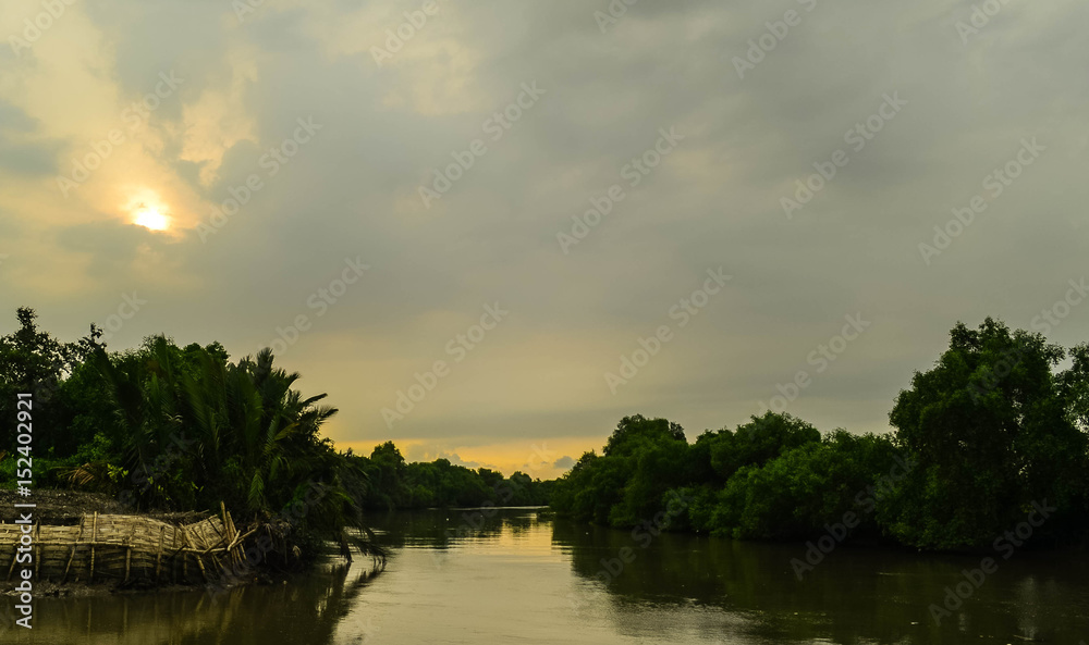 Background photo of the river in the afternoon is very beautiful Background photo of the river in the afternoon is very beautiful