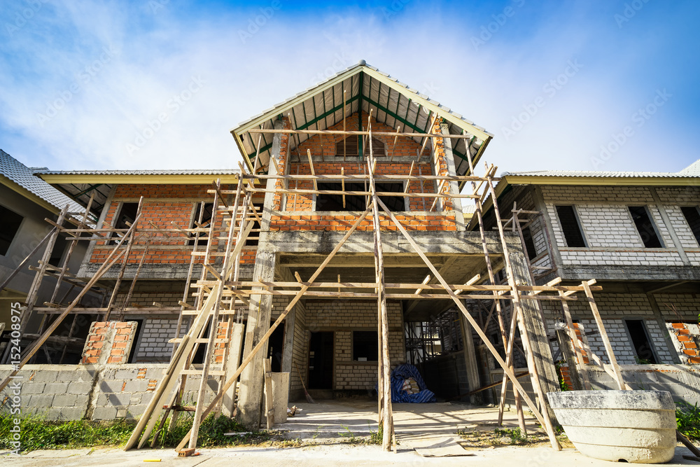 house construction building on blue sky vintage filter - can use to display or montage on product