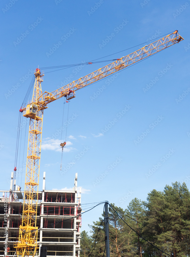 High crane at a construction site