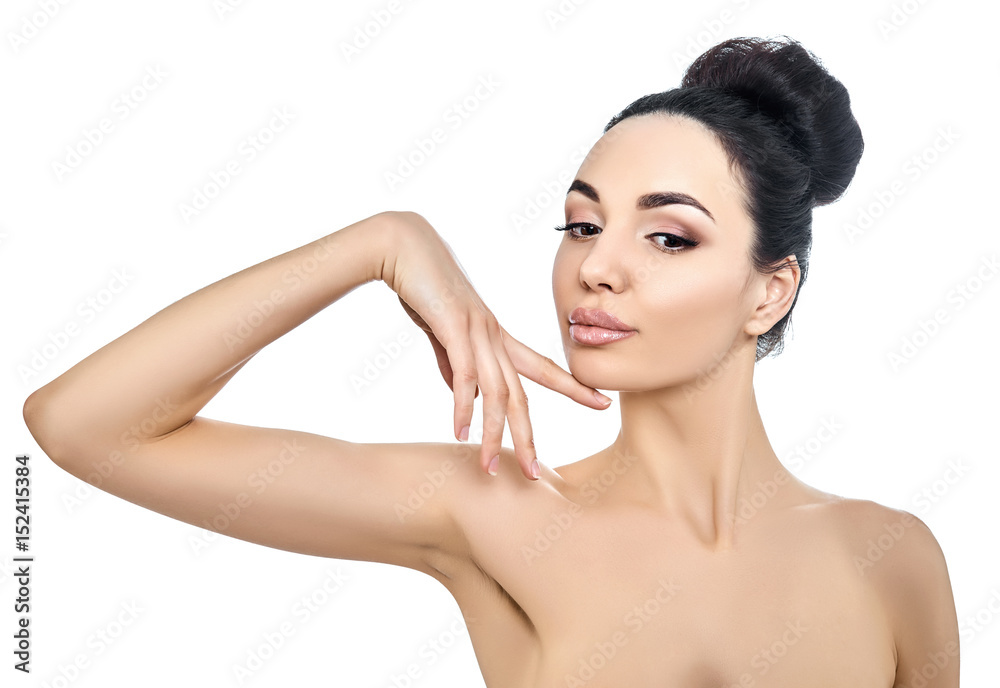 Fototapeta premium Portrait of beautiful woman. Attractive girl posing at studio over white background with copy space.