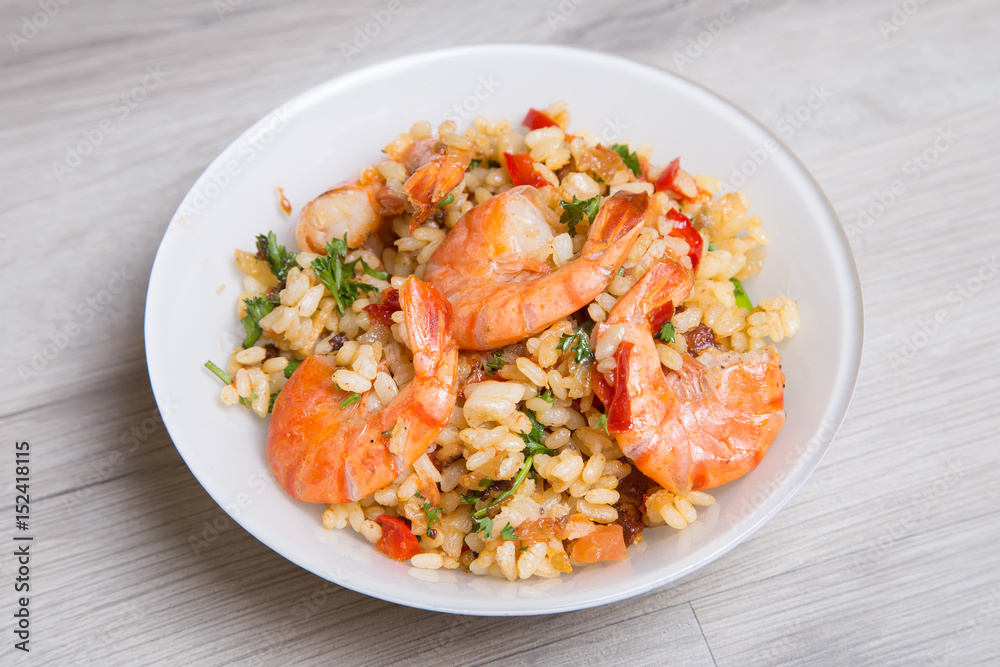 Paella with shrimps and mussels. Traditional Spanish dish Paella with shrimps and mussels. Traditional Spanish dish
