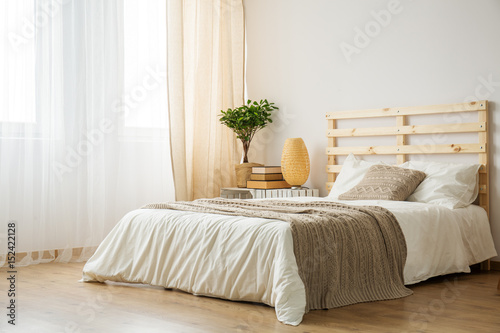 Bed in modern bedroom photo