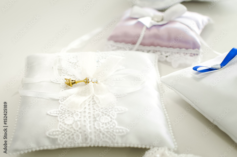 Beautiful pads for wedding rings. Close-up, soft focus. Beautiful pads for wedding rings. Close-up, soft focus.