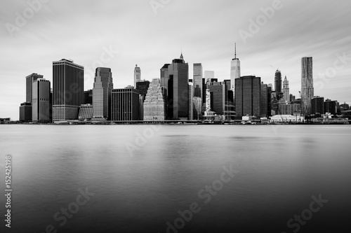 Manhattan downtown skyline in cloudy day  black and white colors  New York  USA