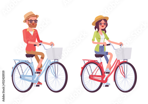 Young man and woman riding bikes