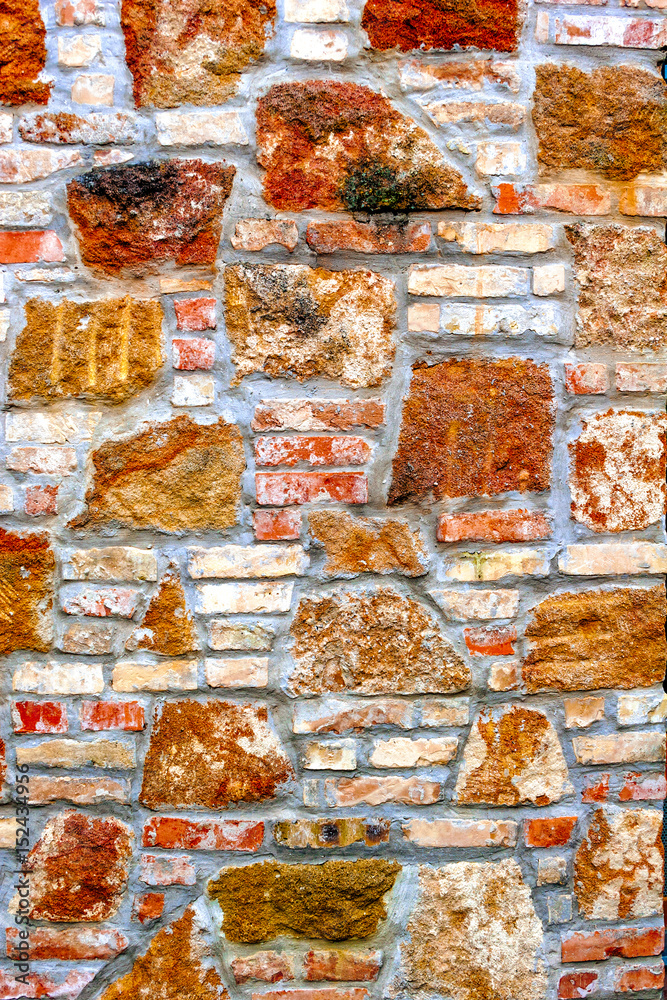 Naklejka premium Rough grunge natural stone-brick wall pattern