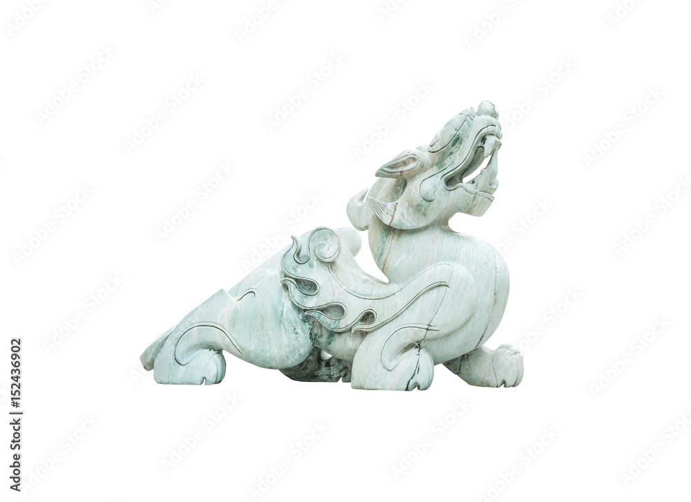 Closeup old green jade leo statue for good fortune in front of door in the temple of thailand isolated on white background with clipping path