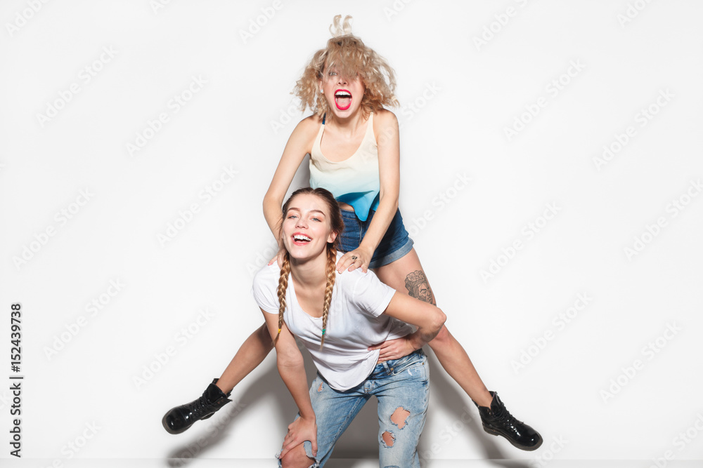 Cheerful laughing young friends