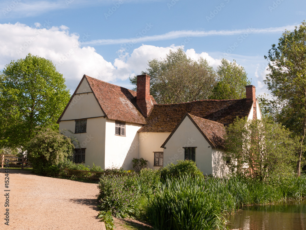 Willy Lott's Cottage outside in flatford mill in constable country old and famous location building from a painting on a summer afternoon with no people