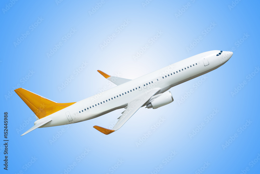 Obraz premium white airplane on a blue background