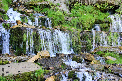 Hillside and cascade of the waterfalls