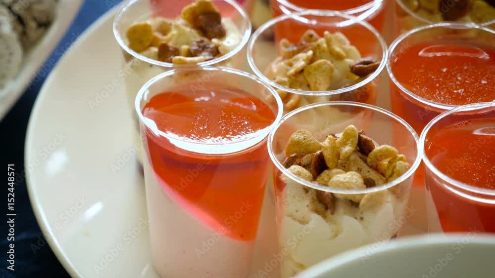 Jelly with cream and nuts in cup Jelly with cream and nuts in cup