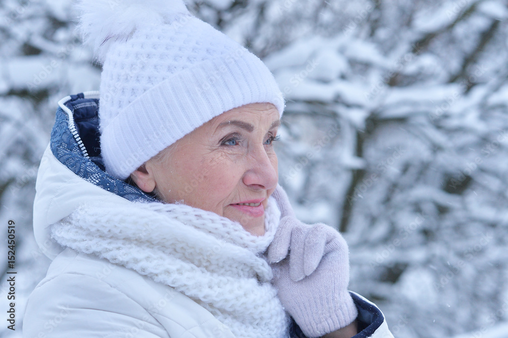 Senior woman in frosty winter Senior woman in frosty winter