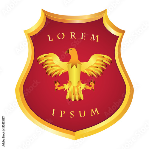 Heraldic German golden shield with an image of an eagle on a red background