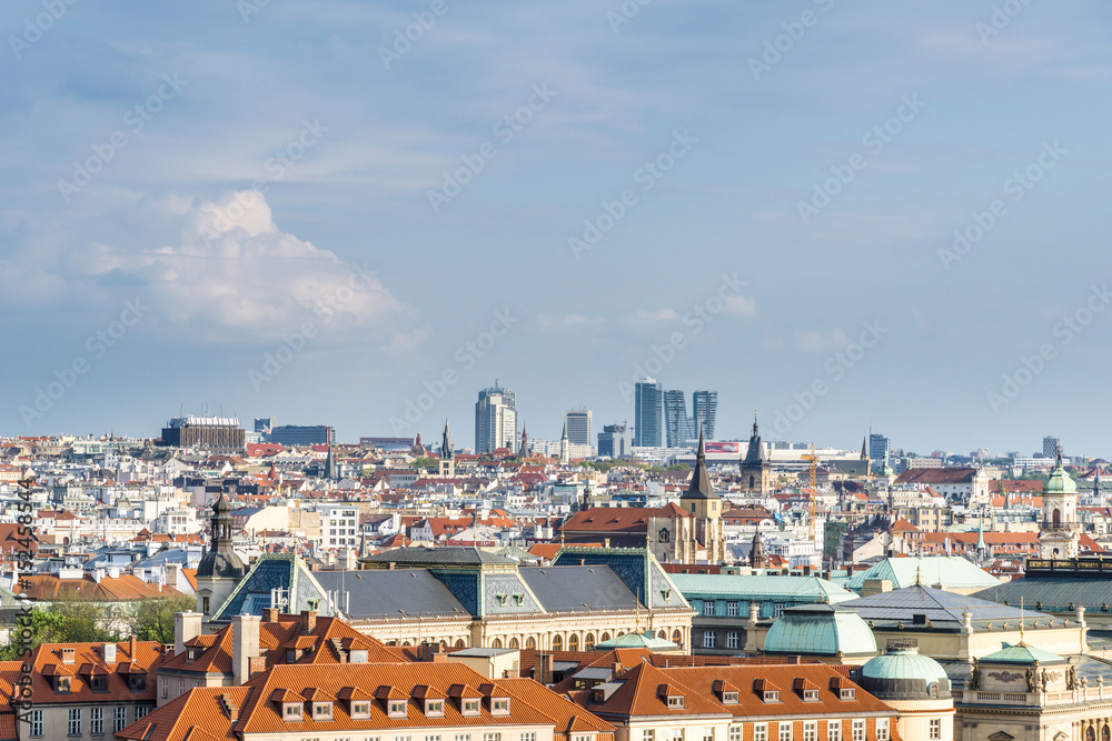 Panoramic view of old Prague with new skyscrapers on the background.
