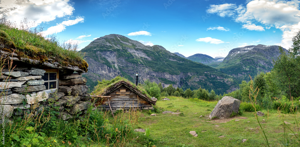 Scandinavian traditional houses with grass roofs Scandinavian traditional houses with grass roofs
