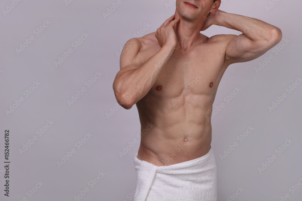 Male laser epilation. Attractive man torso hair removal. Close up on perfect male body, muscles