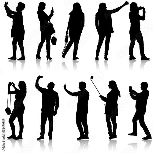 Set silhouettes man and woman taking selfie with smartphone on white background