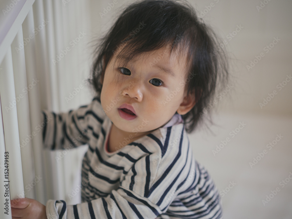 baby girl in cot baby girl in cot