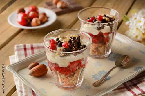 Strawberry desserts with sponge cake and vanilla cream