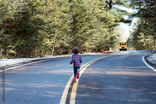 child running after bus