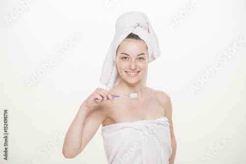 Cheerful girl with a toothbrush