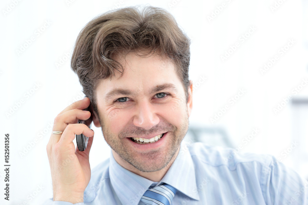 Portrait of a handsome businessman calling Portrait of a handsome businessman calling