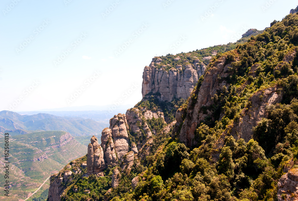 The mountain Montserrat with the Benedictine monastery of Santa Maria de Montserrat near Barcelona, Spain The mountain Montserrat with the Benedictine monastery of Santa Maria de Montserrat near Barcelona, Spain