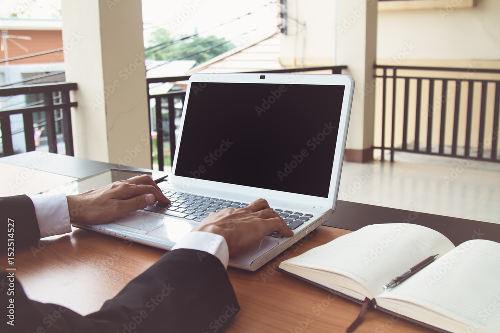 Businessman working on laptop. Businessman working on laptop.