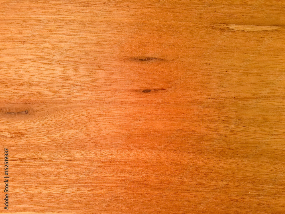 Fototapeta premium Smooth wooden texture with natural grain patterns and warm tones, perfect for backgrounds and design projects.