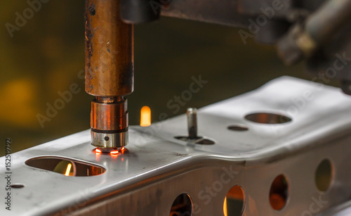Spot welding machine, automotive part in a car factory
